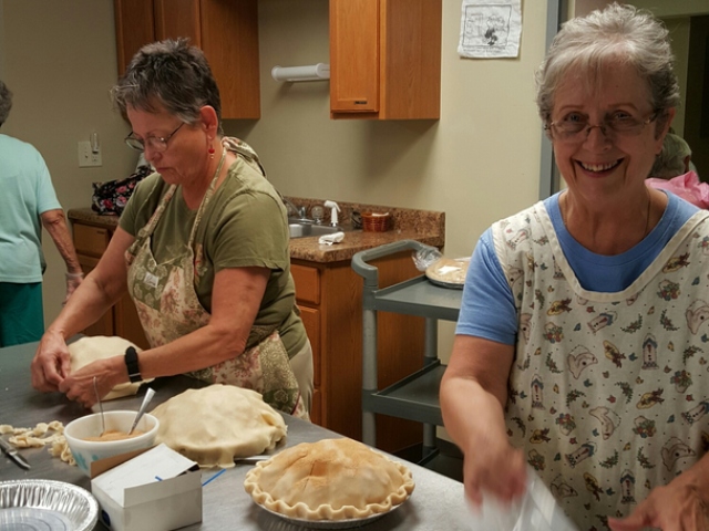 ladies making pies